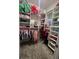 Spacious walk-in closet with custom shelving and storage for optimal organization at 187 Aces High Ln, Davenport, FL 33896
