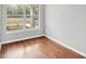Bonus room with wood floors and a window with bright, natural light at 25 Maple Crse, Ocklawaha, FL 32179