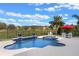 Beautiful pool and spa create a perfect outdoor escape with serene water features at 31746 Red Tail Blvd, Sorrento, FL 32776