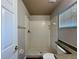 Tiled walk-in shower featuring neutral tile and updated fixtures in this home's bathroom at 324 Anchovie Ct, Kissimmee, FL 34759