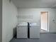 Dedicated laundry area featuring a washer and dryer for added convenience at 324 Anchovie Ct, Kissimmee, FL 34759