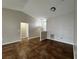 Bright, open-concept living area featuring tile floors and neutral paint, with doorways to other rooms at 324 Anchovie Ct, Kissimmee, FL 34759