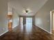 Bright living space featuring tile floors, neutral walls, and a sliding glass door to outdoor space at 324 Anchovie Ct, Kissimmee, FL 34759