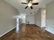 Open living room features neutral walls, tile flooring, and ample natural light at 324 Anchovie Ct, Kissimmee, FL 34759