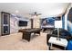 Exciting game room featuring Star Wars theming, two pool tables, and comfortable seating at 3432 Lilac Way, Davenport, FL 33897