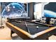 Engaging game room boasting a pool table, air hockey, and fun Star Wars themed decor at 3432 Lilac Way, Davenport, FL 33897
