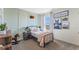Stylish bedroom with green walls, a bed, art and furniture at 3609 Salvia Ct, Tavares, FL 32778