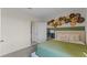 Relaxing bedroom with a comfortable bed, light-filled windows, and decorative wall art at 3609 Salvia Ct, Tavares, FL 32778
