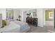 Serene bedroom featuring a plush bed, neutral tones, and stylish furniture at 3609 Salvia Ct, Tavares, FL 32778