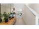 Bright foyer with tile floors, decor, and an open view to the dining and living spaces at 3609 Salvia Ct, Tavares, FL 32778