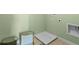 A utility sink and storage in a well-organized laundry area at 3609 Salvia Ct, Tavares, FL 32778