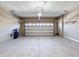 View of the inside of the garage featuring a new garage door with windows at 363 Buchannan Drive, Davenport, FL 33837