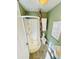 Compact bathroom featuring a stand-up shower, tiled floors, and neutral colors at 428 E Orange Ave, Eustis, FL 32726