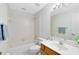 Clean and functional bathroom with a tub, shower, vanity, and neutral tile at 702 Barrington Cir, Winter Springs, FL 32708
