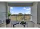 Relaxing balcony with seating and scenic views of the surrounding landscape at 7613 Cabana Ct # 402, Reunion, FL 34747