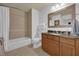 This bathroom includes a shower and tub at 7613 Cabana Ct # 402, Reunion, FL 34747