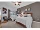 Comfortable bedroom with two beds, a ceiling fan, and a window with natural light at 7613 Cabana Ct # 402, Reunion, FL 34747