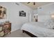 Bright bedroom with large windows, neutral paint, and wall-mounted tv at 7613 Cabana Ct # 402, Reunion, FL 34747