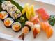 Delicious sushi assortment on a white plate at 7613 Cabana Ct # 402, Reunion, FL 34747