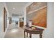 Entrance hallway with view of dining and living areas and decorative artwork at 7613 Cabana Ct # 402, Reunion, FL 34747