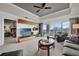 Bright living room with balcony access offering stunning views at 7613 Cabana Ct # 402, Reunion, FL 34747