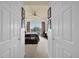 This carpeted bedroom has neutral walls, and a view of an outdoor vista at 7613 Cabana Ct # 402, Reunion, FL 34747