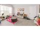 Inviting playroom with ample space for activities and organized storage solutions at 7845 Dausset St, Orlando, FL 32827