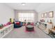 Spacious bonus room with bean bag chair and ample storage space at 7845 Dausset St, Orlando, FL 32827