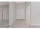 Spacious foyer with tile flooring and double front door entrance at 820 E Flag Ln, Kissimmee, FL 34759