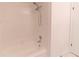 Bright bathroom with a tiled shower-tub and simple, clean fixtures at 820 Rayston, Deltona, FL 32725