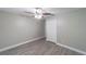 Cozy bedroom featuring a ceiling fan, closet, and neutral wall paint at 820 Rayston, Deltona, FL 32725