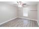 Cozy bedroom featuring a ceiling fan, a window, and neutral wall paint at 820 Rayston, Deltona, FL 32725
