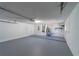 The expansive garage includes a convenient utility sink and storage shelves for organization at 820 Rayston, Deltona, FL 32725