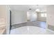 Open-concept living area seamlessly blends tile and wood flooring at 820 Rayston, Deltona, FL 32725