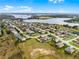 Real estate aerial view, showing a well-planned community with large lake and attractive homes at 9518 Lynwood St, Clermont, FL 34711