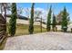 Paver patio in backyard with privacy fence and professional landscaping at 9518 Lynwood St, Clermont, FL 34711