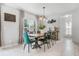 Charming dining area with modern decor and ample natural light at 9518 Lynwood St, Clermont, FL 34711