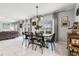 Inviting dining area with a stylish table, chairs, and plenty of natural light at 9518 Lynwood St, Clermont, FL 34711