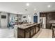 Open kitchen with large island and a combined dining area at 9518 Lynwood St, Clermont, FL 34711