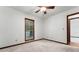 Bedroom featuring carpet flooring, ceiling fan, and ample natural light at 109 Crestwood Dr, Longwood, FL 32779