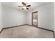 Bedroom with carpet, ceiling fan, paneled windows and base molding at 109 Crestwood Dr, Longwood, FL 32779