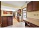 Updated kitchen featuring wood cabinetry, and tile flooring at 109 Crestwood Dr, Longwood, FL 32779