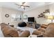 Comfortable living room with furniture, decor, and natural light at 13221 Fountainbleau Dr, Clermont, FL 34711