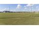 Sprawling soccer field with meticulously maintained grass, goalposts, and professional lighting at 14031 Centerline Dr, Orlando, FL 32827