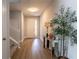 Inviting foyer with a light-filled entrance, decorative console table, and staircase on the left at 14664 Spotted Sandpiper Blvd, Winter Garden, FL 34787