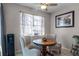 Cozy breakfast nook featuring a round table and bright natural light at 1602 Pine Ridge Dr, Davenport, FL 33896