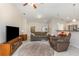 Bright living room with tile flooring and lots of natural light at 195 Maple Dr, Kissimmee, FL 34759