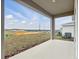 Covered patio with a scenic view of the development at 1988 Sunshine Peak Dr, Minneola, FL 34715