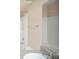 Bright bathroom with bathtub and shower, white tile, and granite countertop sink at 206 E South St # 4031, Orlando, FL 32801