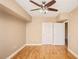 Spacious bedroom with two closets, hardwood floors, and neutral-colored walls at 206 E South St # 4031, Orlando, FL 32801